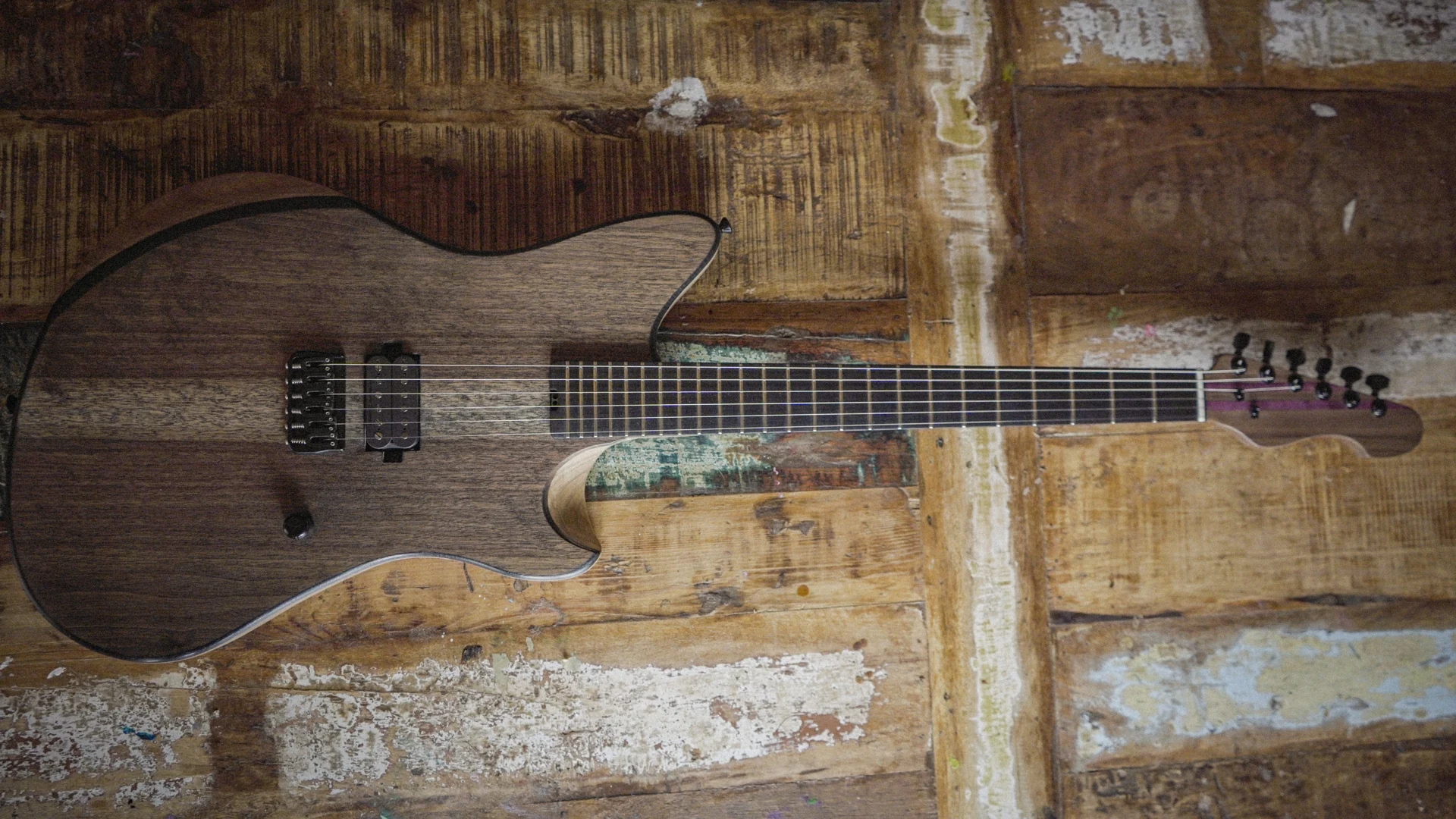 A wood finish electric guitar from E&L Timberworks